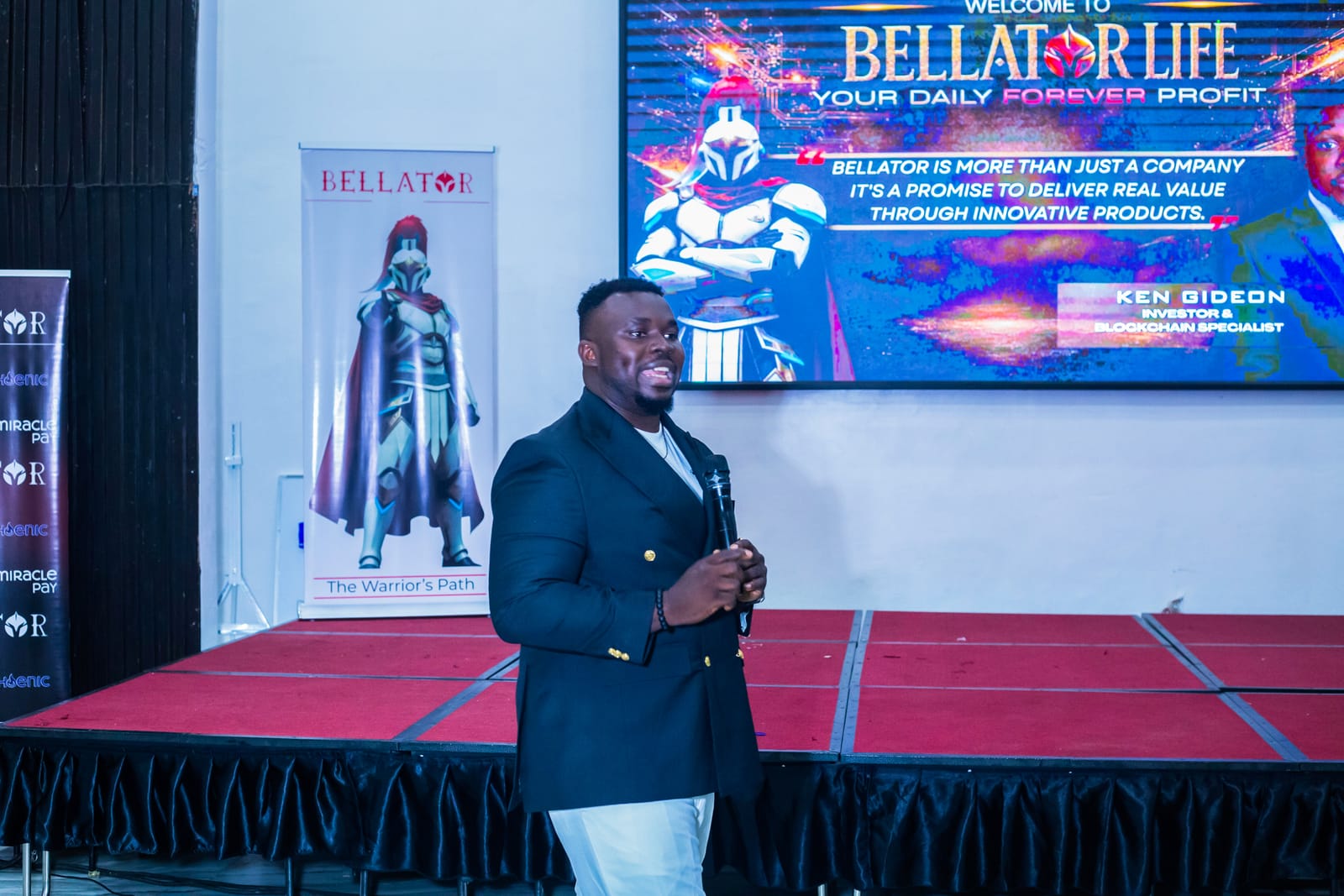 Ken Gideon speaking on stage at a Bellator Life event
